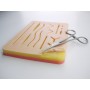 Almohadilla de práctica de sutura con malla