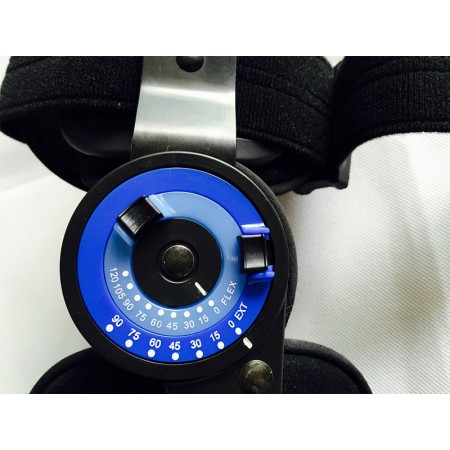 Regulowany - uniwersalny stabilizator kolana pooperacyjny z systemem kontroli ruchu