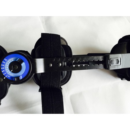 Regulowany - uniwersalny stabilizator kolana pooperacyjny z systemem kontroli ruchu